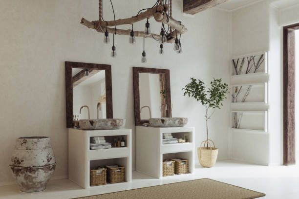 A bathroom with two sinks and two mirrors.