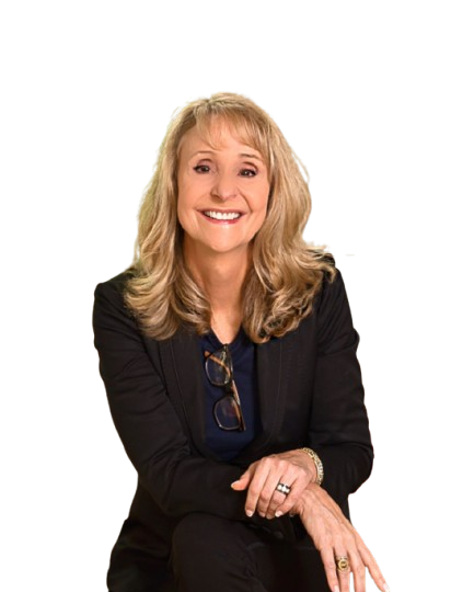 A woman with long blonde hair is smiling for the camera.