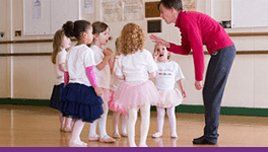 dance teacher instructing the kids