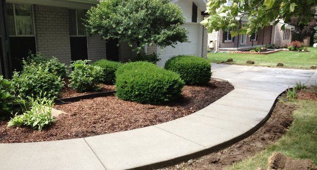Construction Workers Working on Sidewalk — Walled Lake, Mi — All American Cement