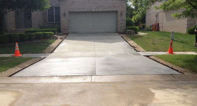 Concrete Is Unloaded from The Concrete Mixer — Walled Lake, Mi — All American Cement