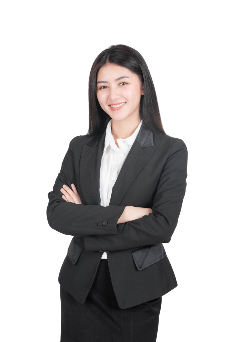 Asian woman in a black business suit, smiling with arms crossed.