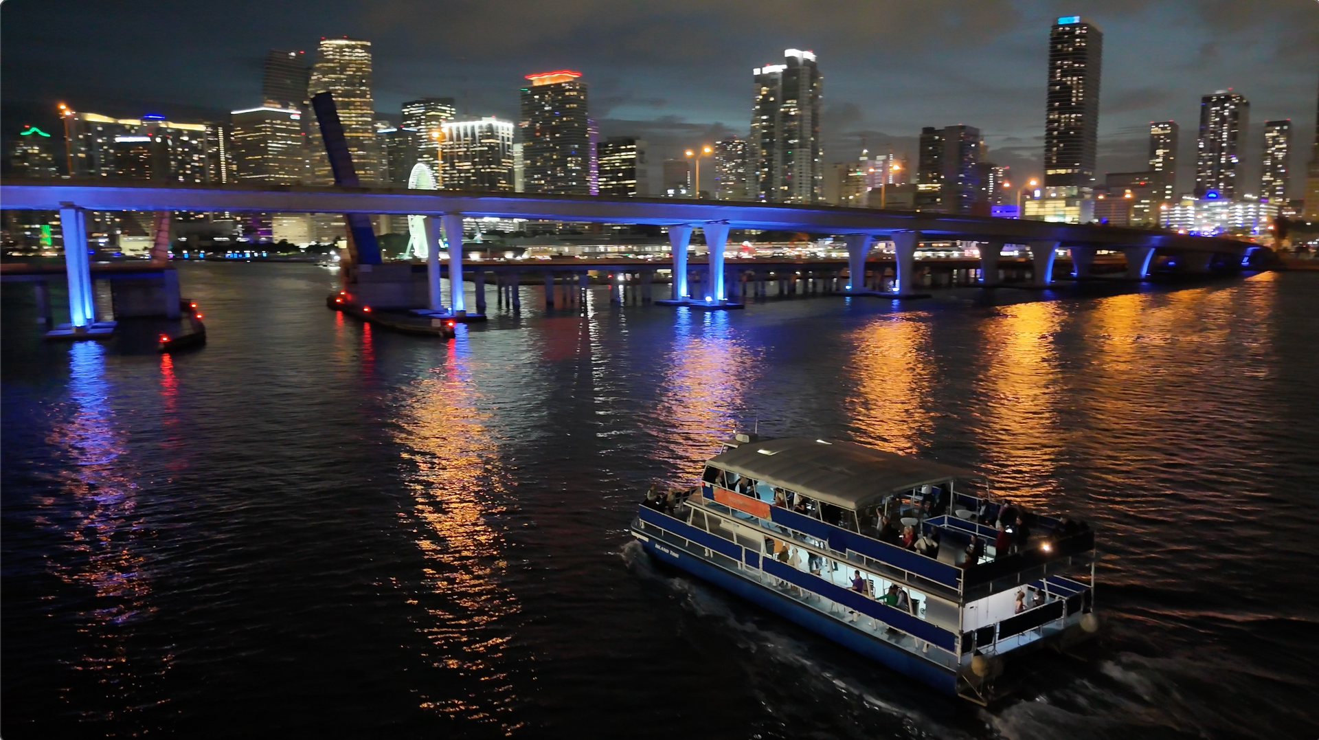 The port of Miami is so beautiful during the Night. The Blue lighting is so Beautiful. This amazing View is Part of our Sunset Cruise from Bayside Marketplace. Miami Skyline.