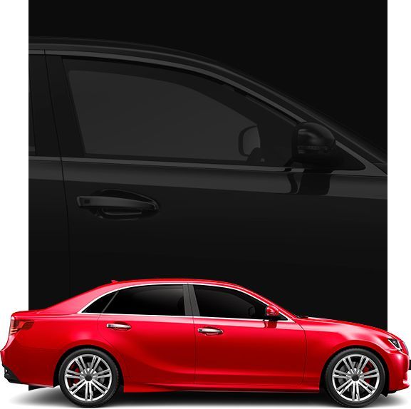 A red car is parked in front of a black car