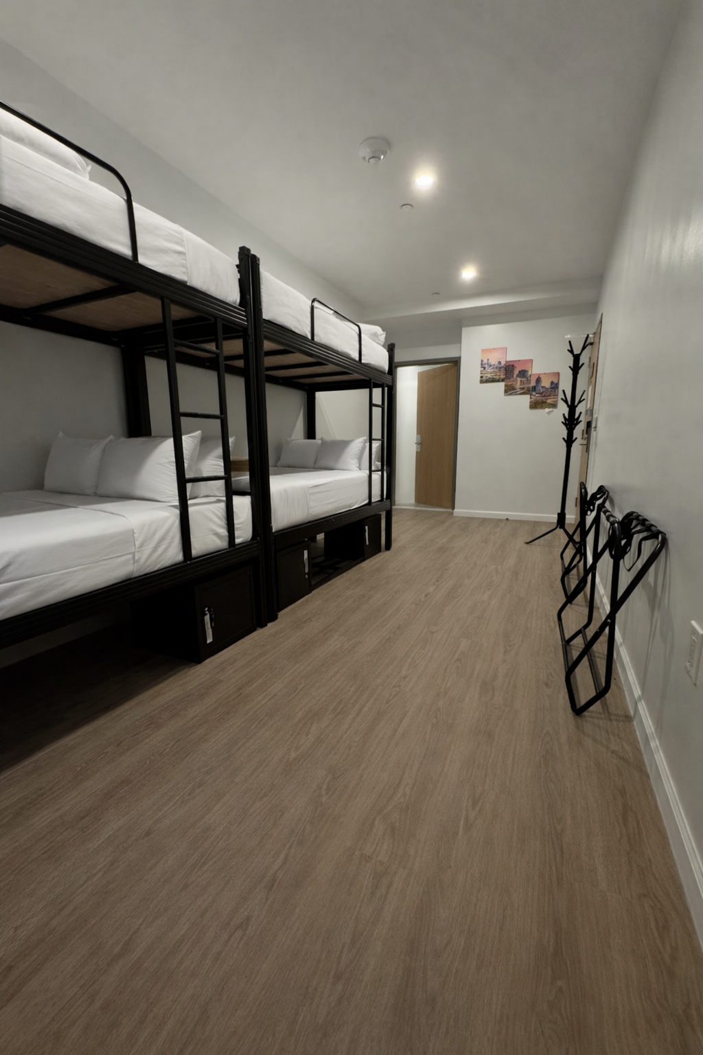 Breakfast on a tray in a luxurious bedroom. Orange juice, eggs, pastries on a white tablecloth.