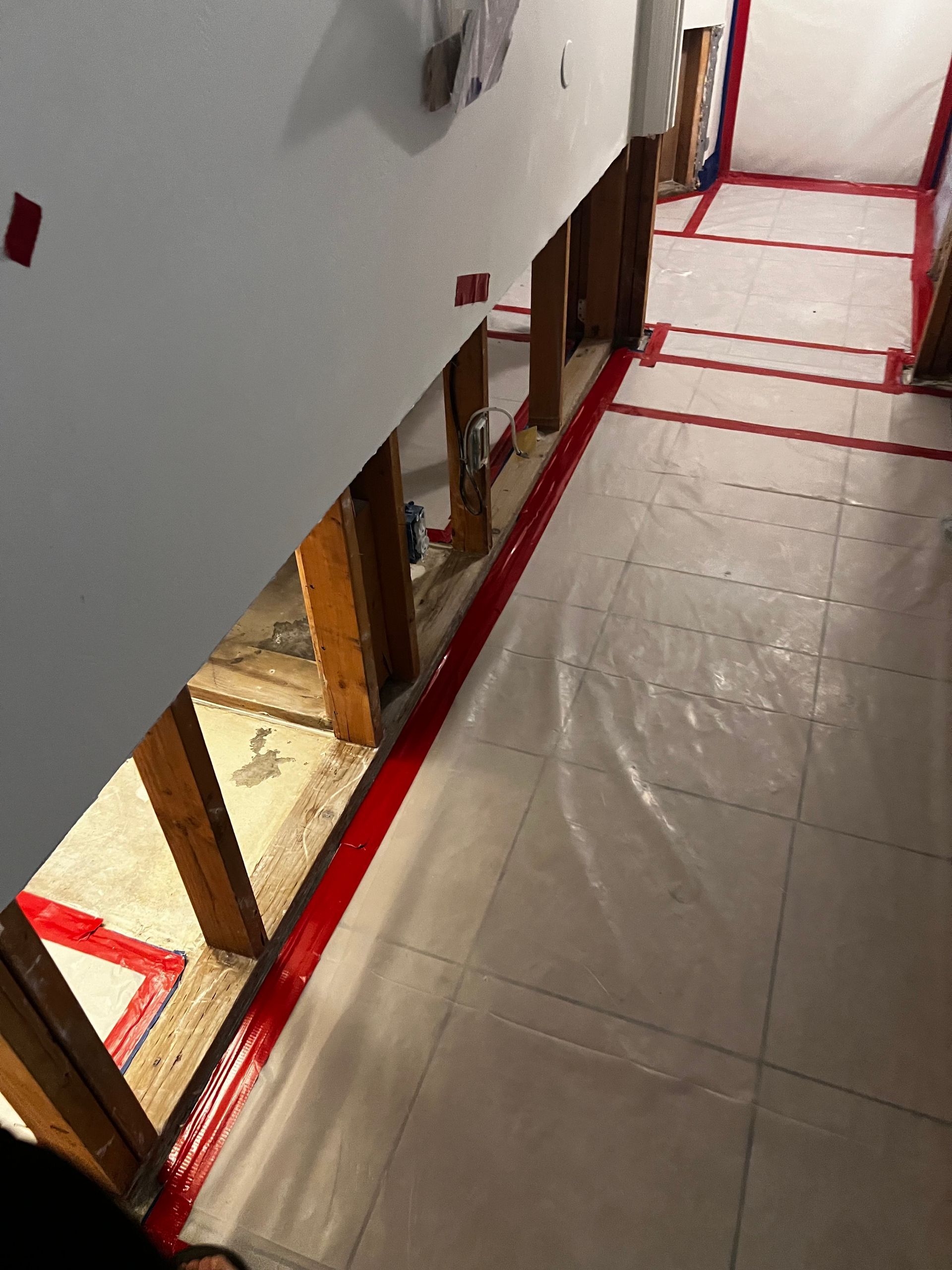 A room with a lot of plastic on the floor