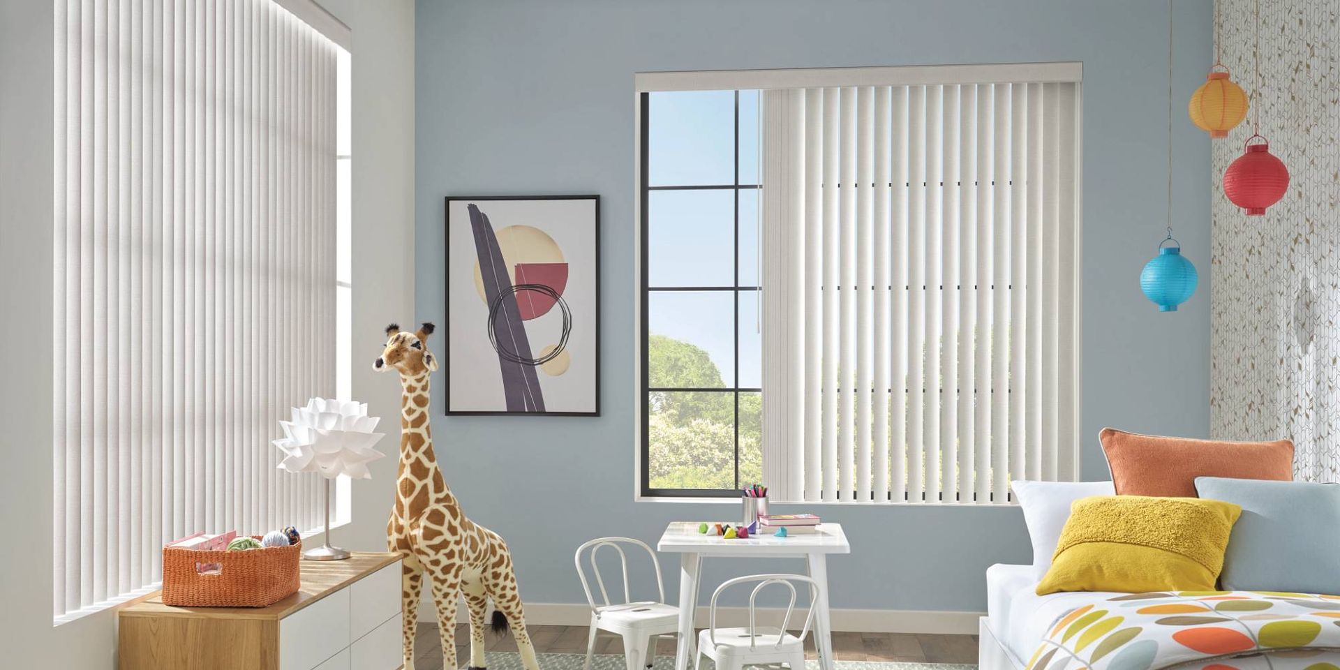 Hunter Douglas Vertical Solutions® Vertical Blinds on large windows in a child’s bedroom