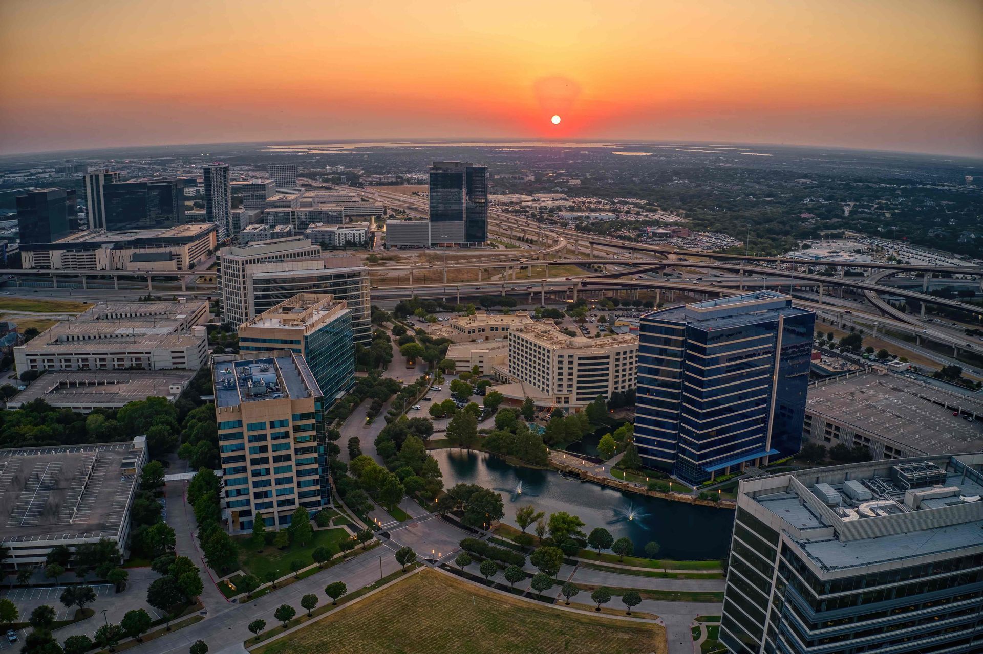An aerial photograph of a portion of Plano, Texas, at sunset, south of Prosper, TX