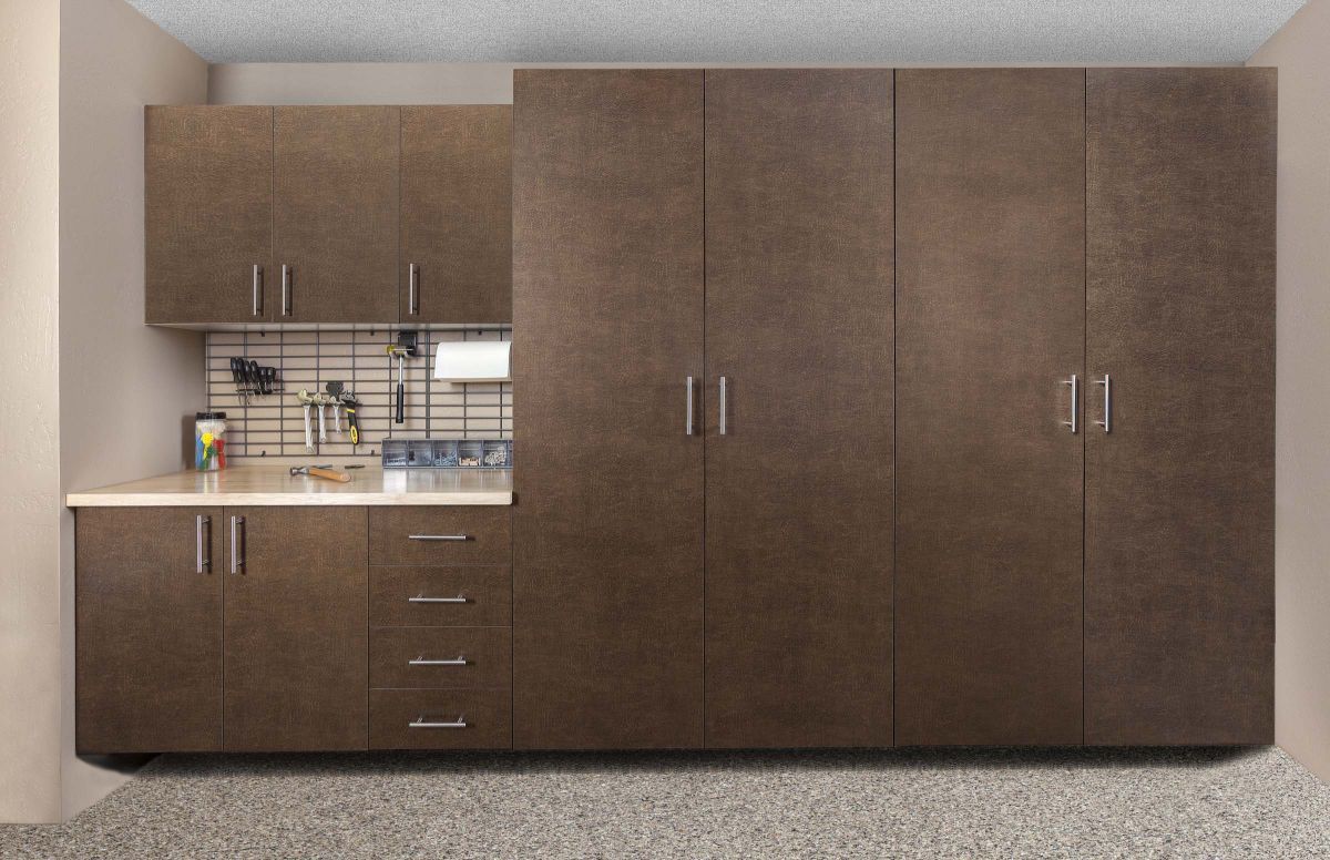 A kitchen with a lot of cabinets and drawers