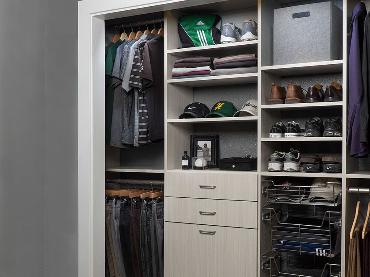 A kids closet filled with lots of clothes and shoes