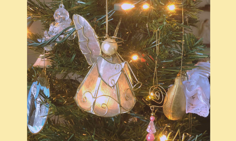 Angel ornament on Christmas tree