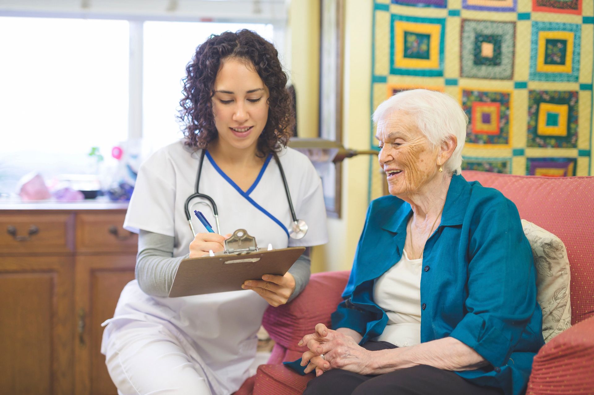 A nurse assisting an older female patient, highlighting compassionate private duty nursing care. A nurse assisting an older female patient, highlighting compassionate private duty nursing care.