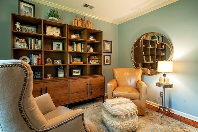 A cozy therapy room with 2 comfortable armchairs