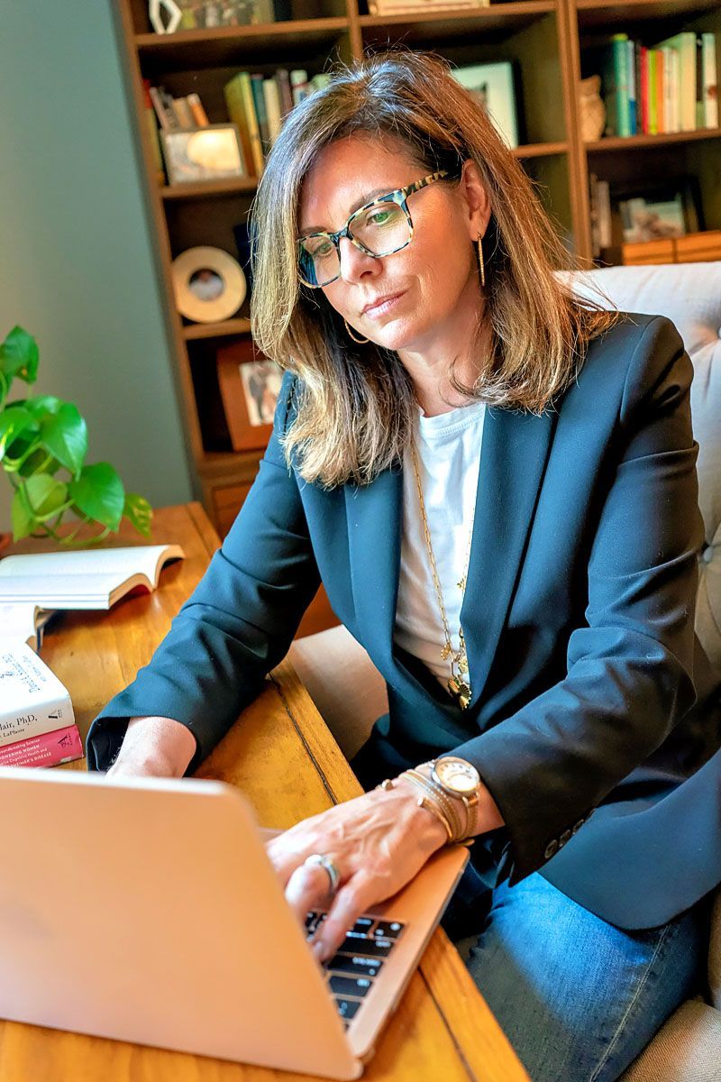 Jamie Hartman working on her computer