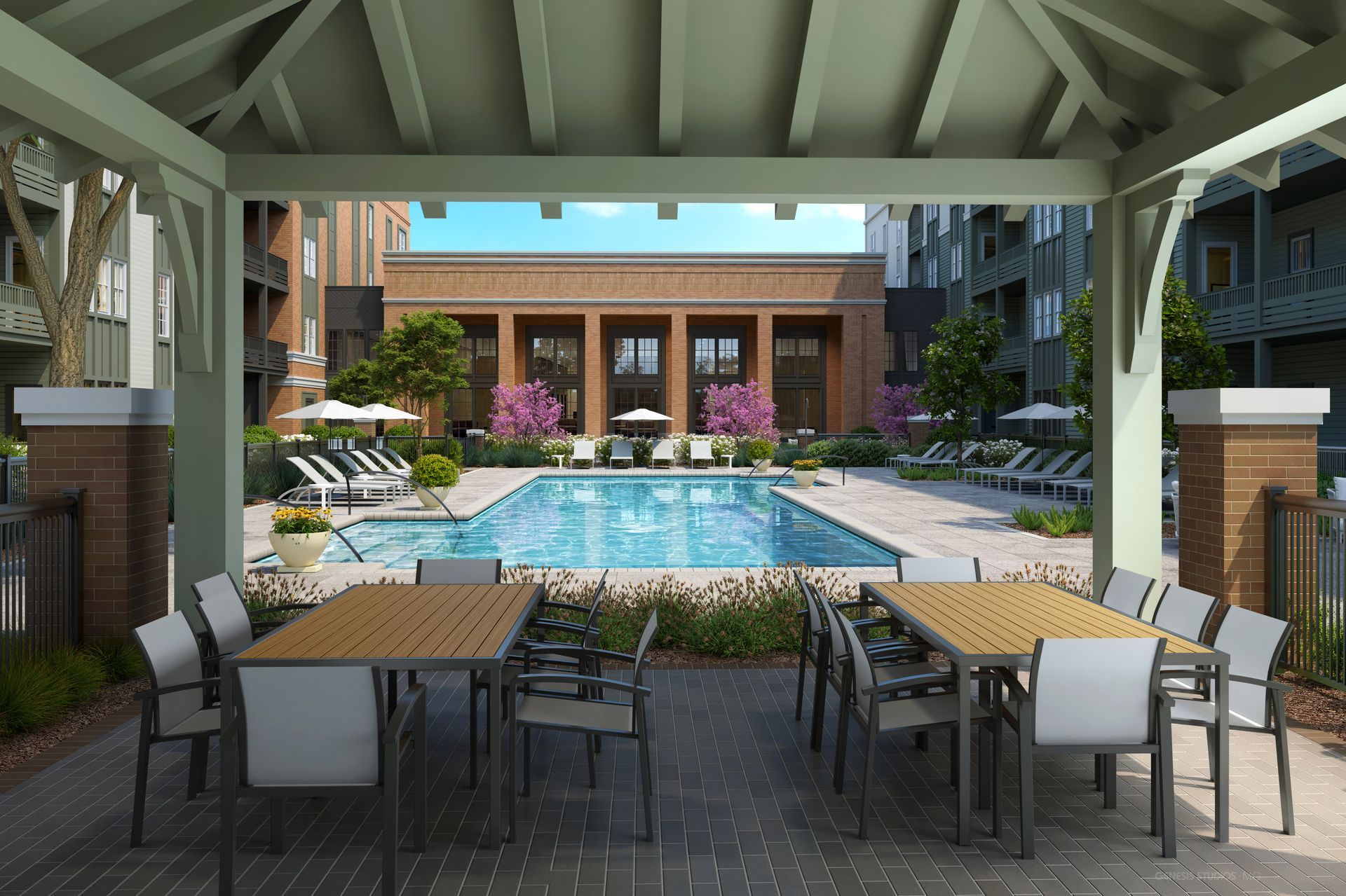 An artist 's impression of a pool area with tables and chairs