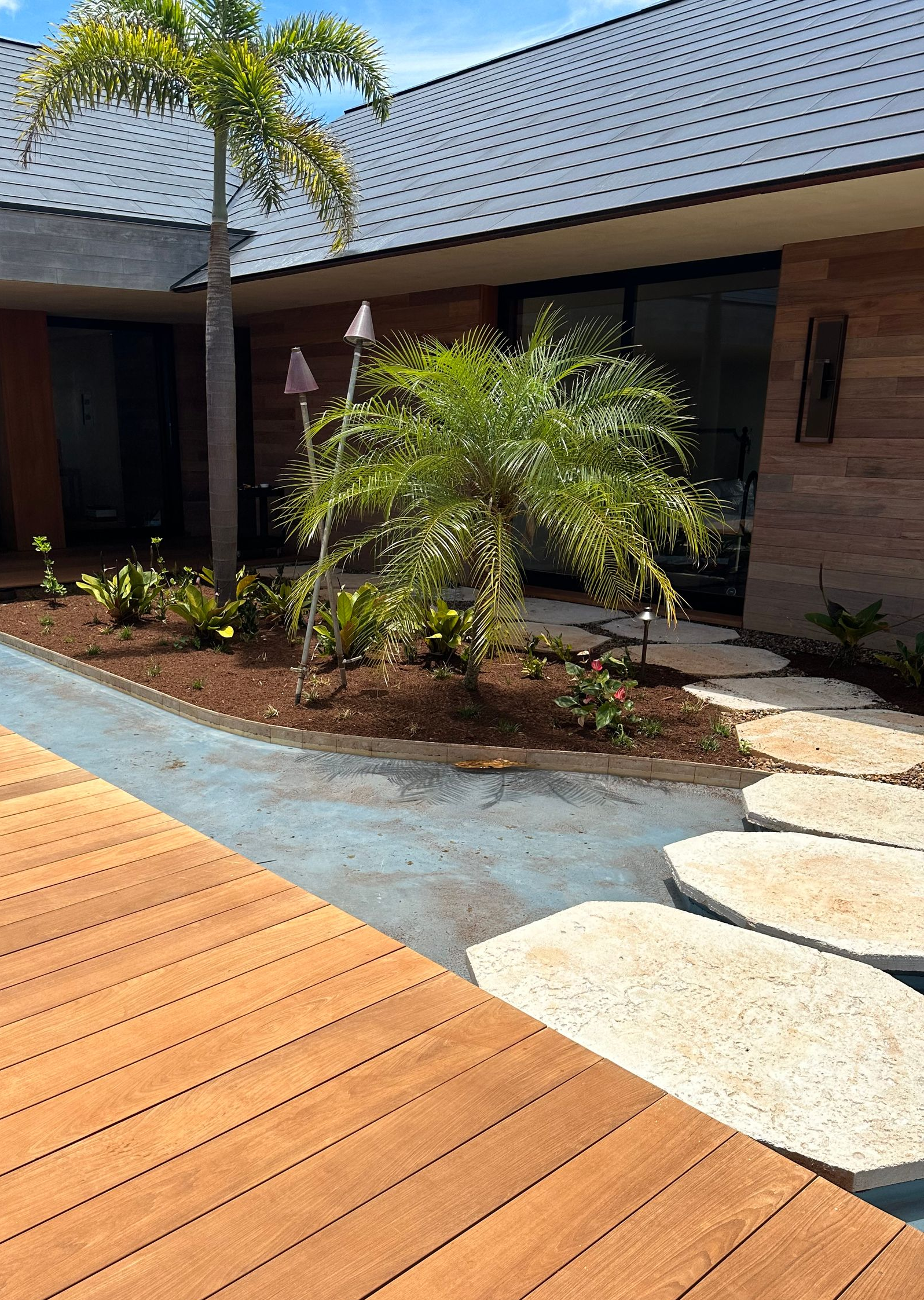 Wooden deck with stepping stones.