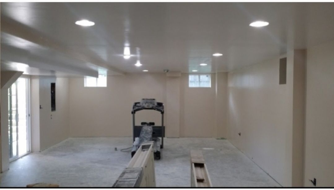 A view of a tiled floor from the second floor of a house.