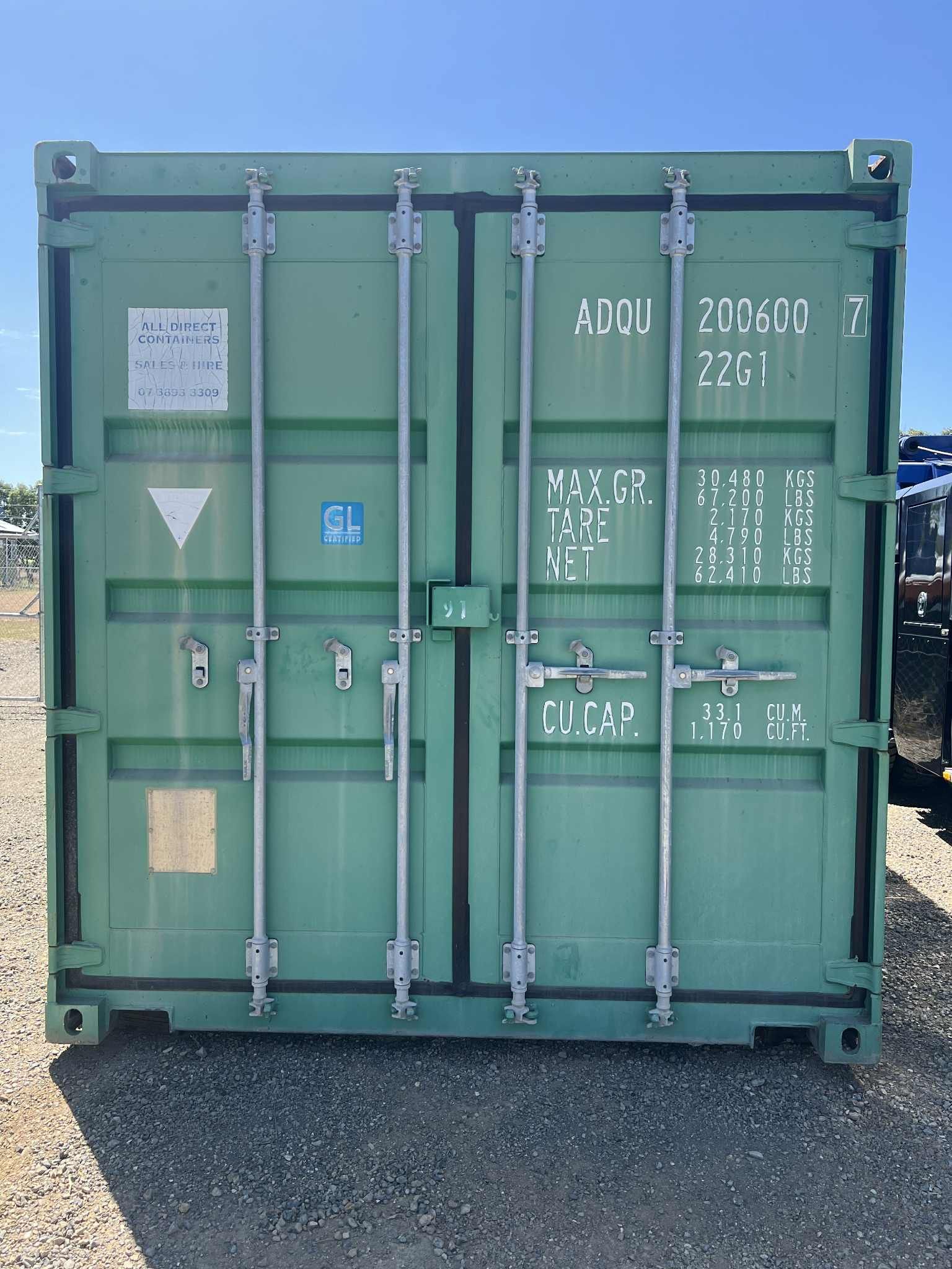 Green Shipping Container With Closed Doors, Outdoor Setting  — Rockhampton Container Sales in Kawana, QLD