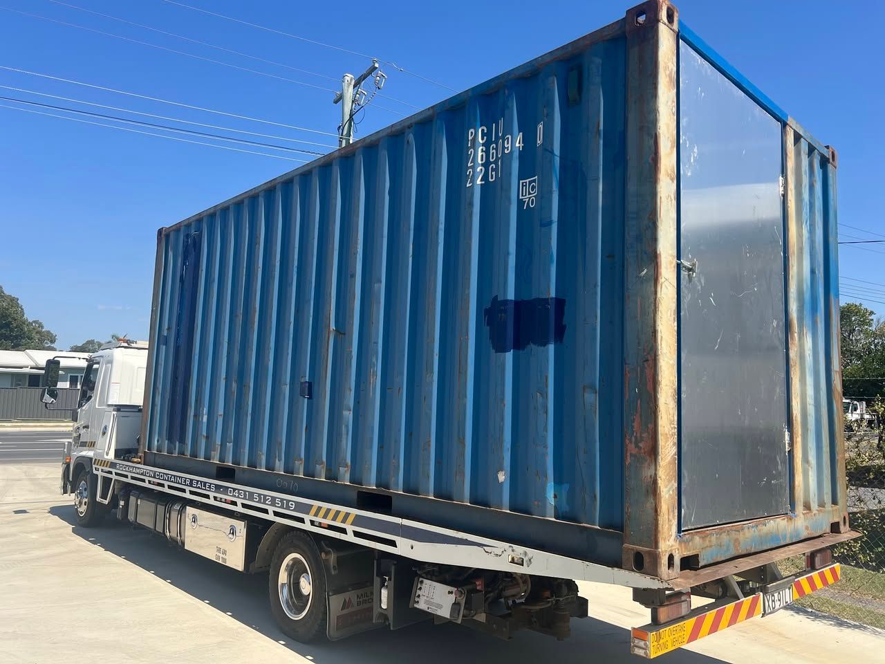 Red Shipping Container on a Trailer — Rockhampton Container Sales in Kawana, QLD