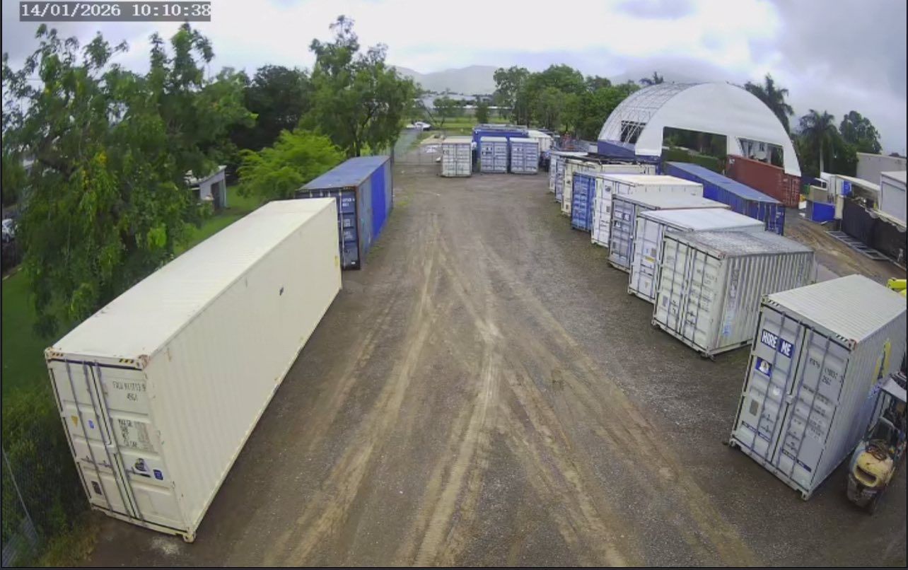 Overhead View of a Storage Yard With Shipping Containers of Various Colors  — Rockhampton Container Sales in Kawana, QLD