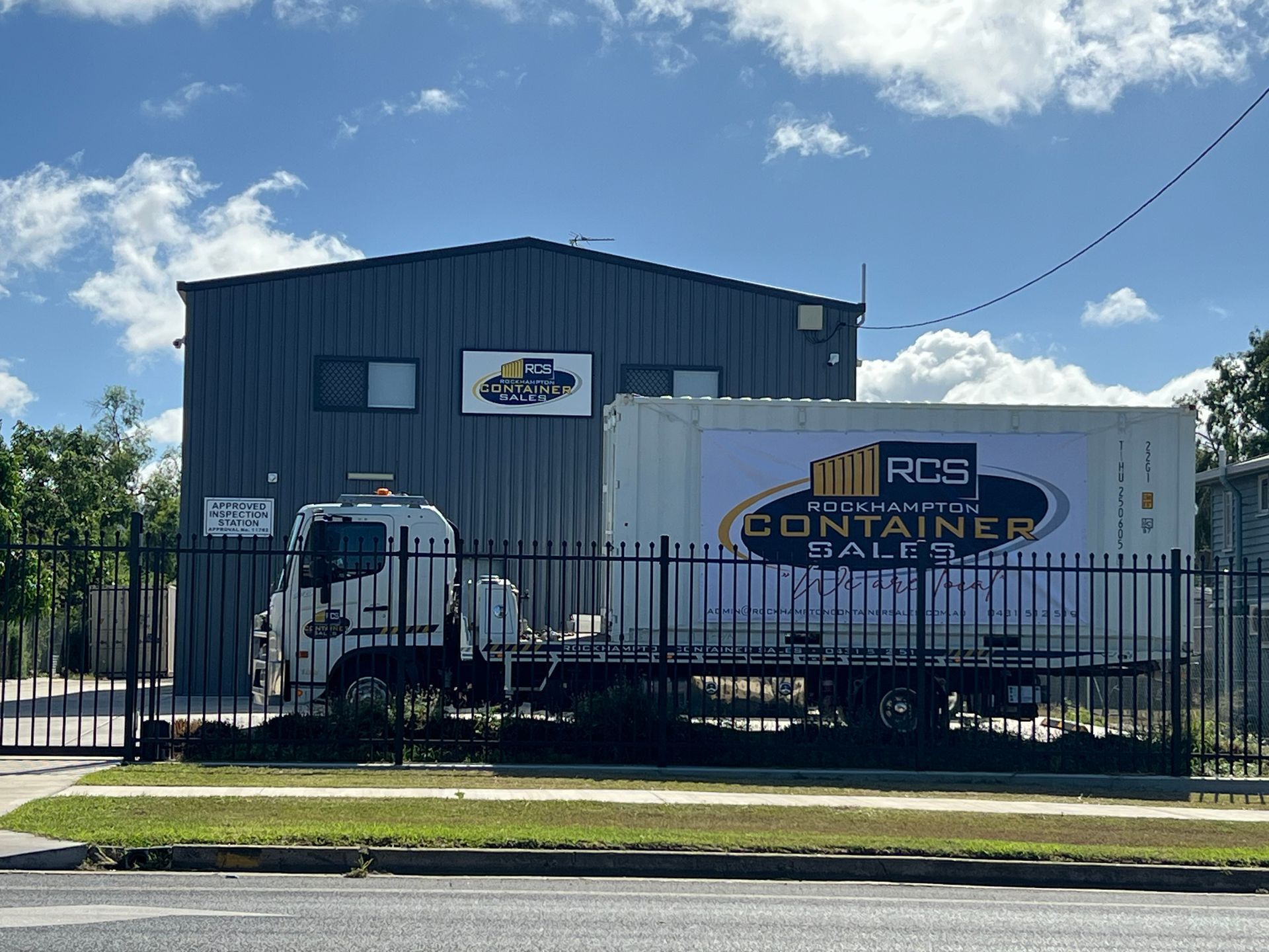 Blue Shipping Container Modified With a Door and Window, Sitting Outdoors  — Rockhampton Container Sales in Kawana, QLD