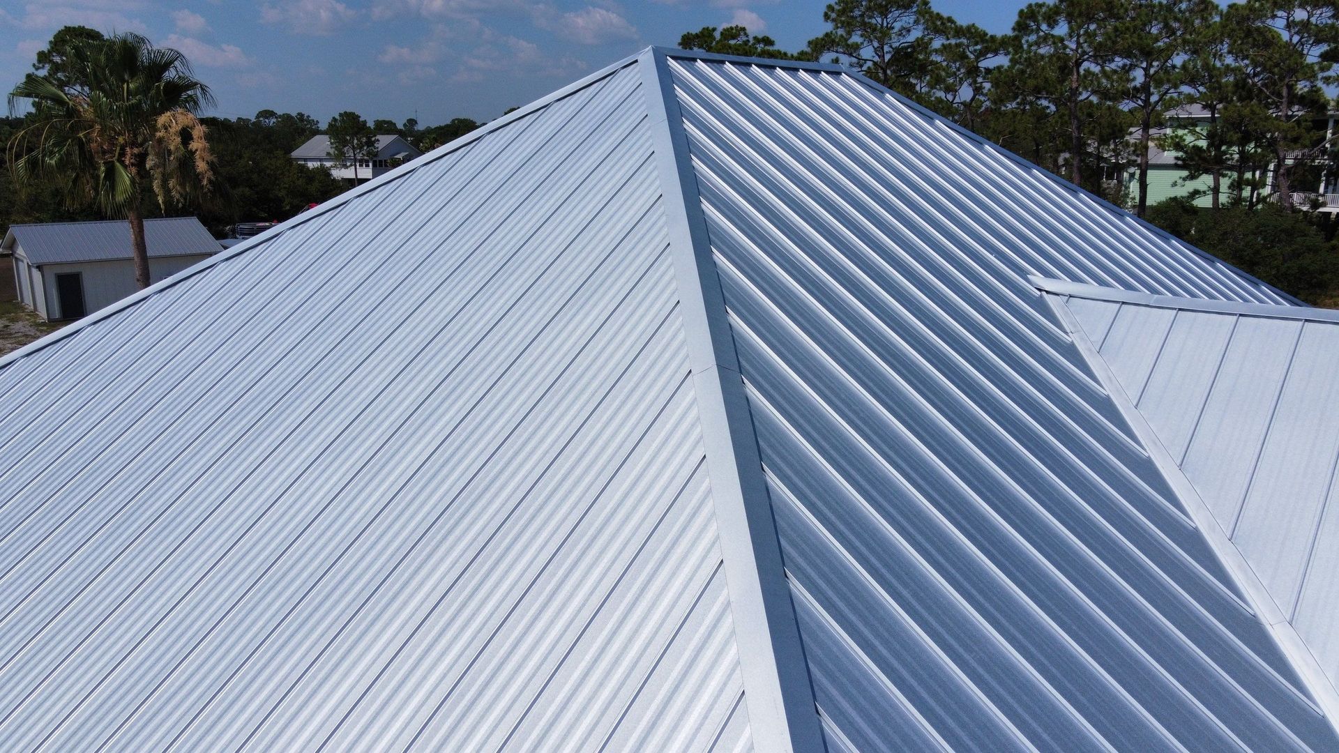 The roof of a house has been painted white