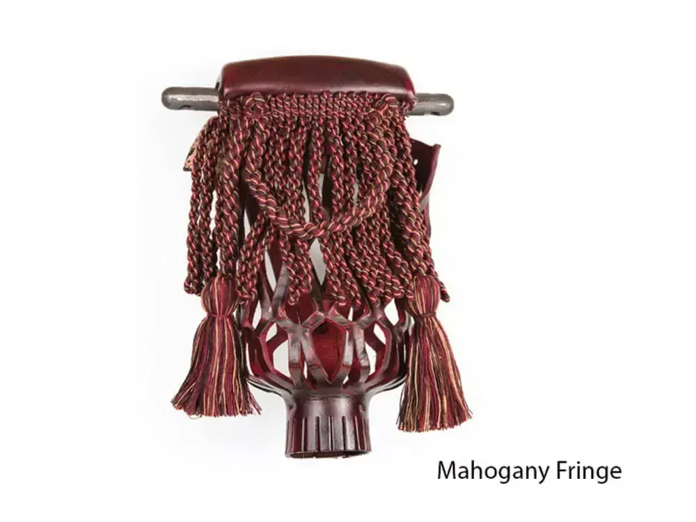 Mahogany colored pool table pocket with fringe.