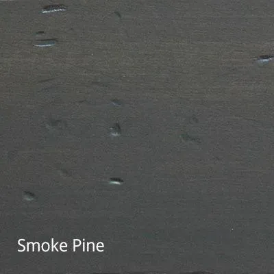 Smoke Pine wood sample, dark gray with visible grain and knots.