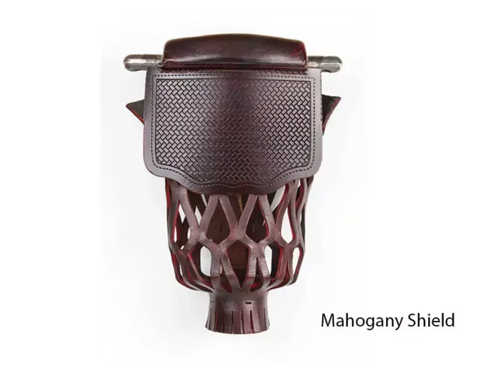 Mahogany-colored pool table pocket with a shield-shaped leather panel and decorative basket weave.