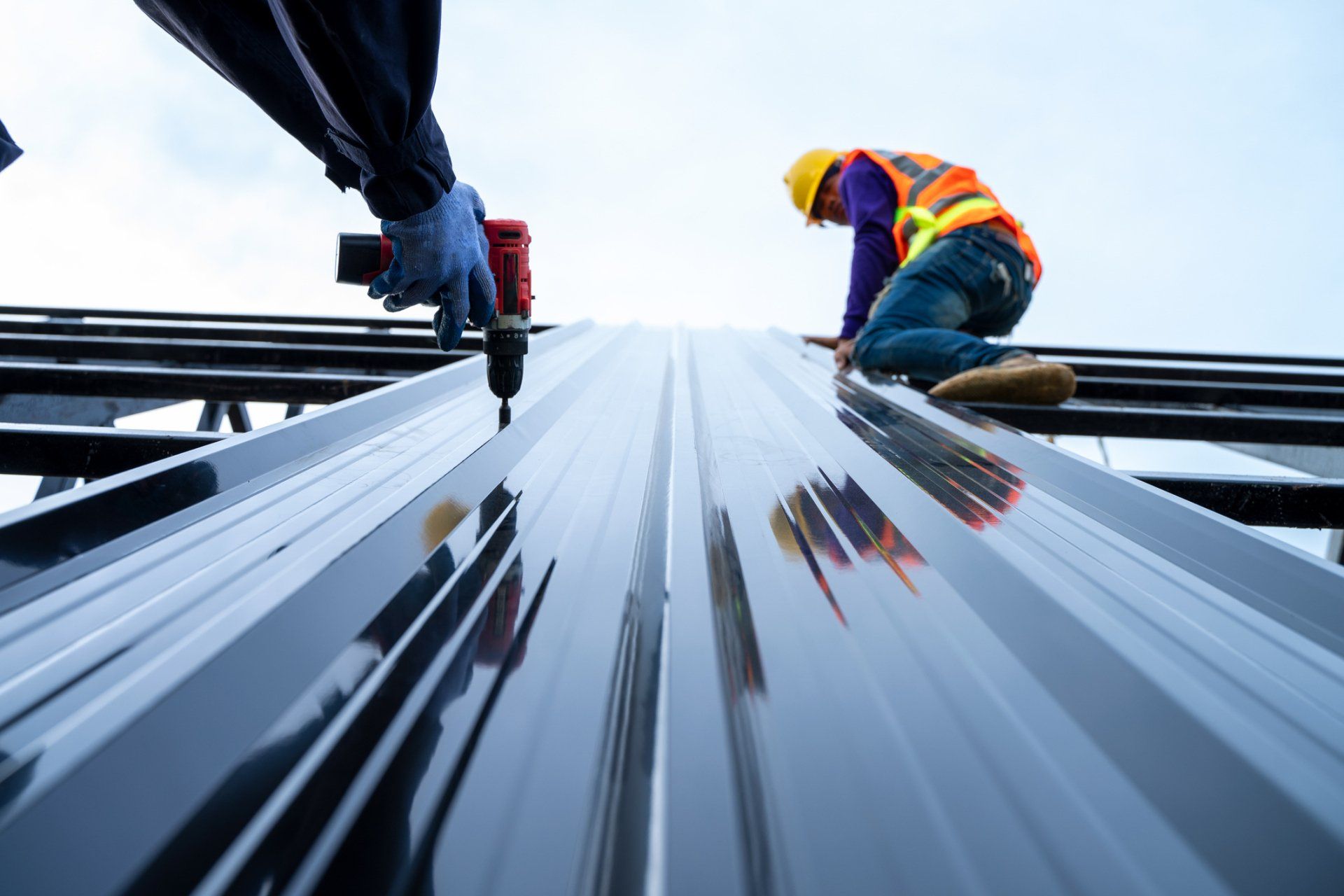 Roofer worker installing new roof — Bluff City, TN — Todd Harkleroad Roofing Inc.