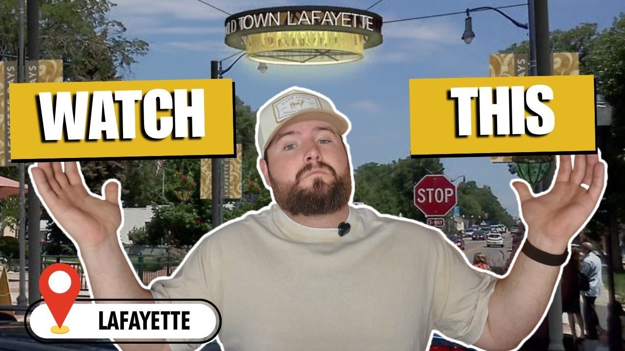 Man in beige shirt with raised hands, “WATCH THIS” text, and Lafayette street scene background