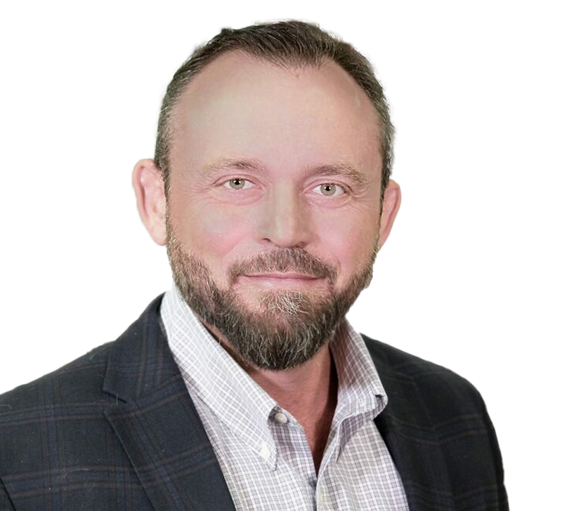 President Steve Weclew with a beard in a suit jacket smiles at the camera.