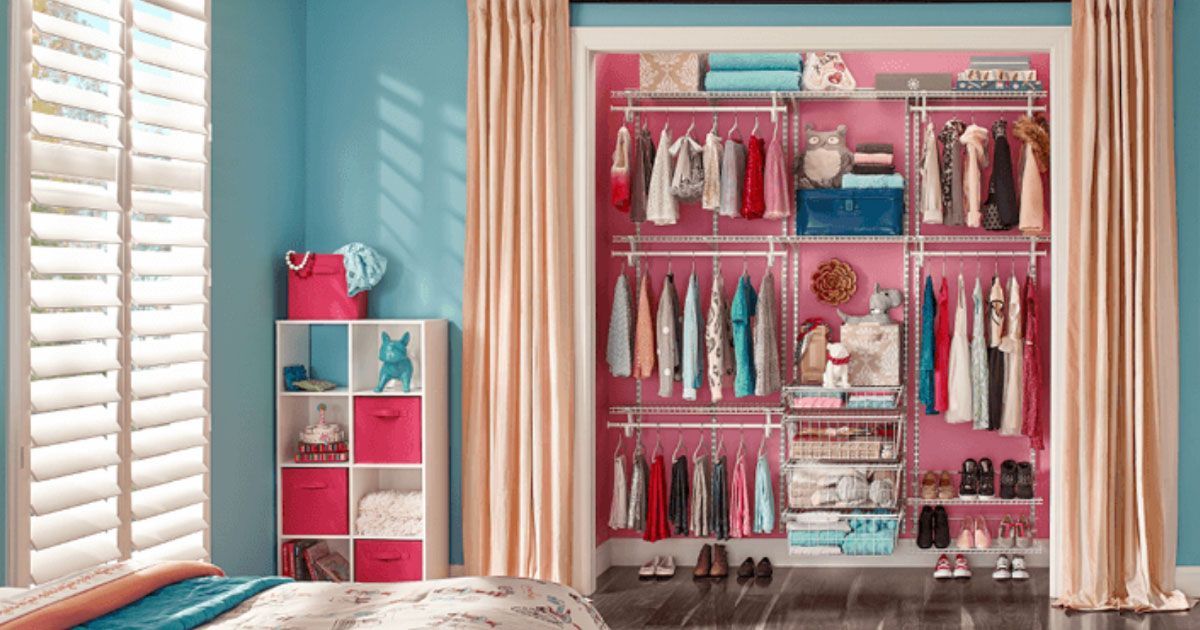 a bedroom with a pink closet and a bed .