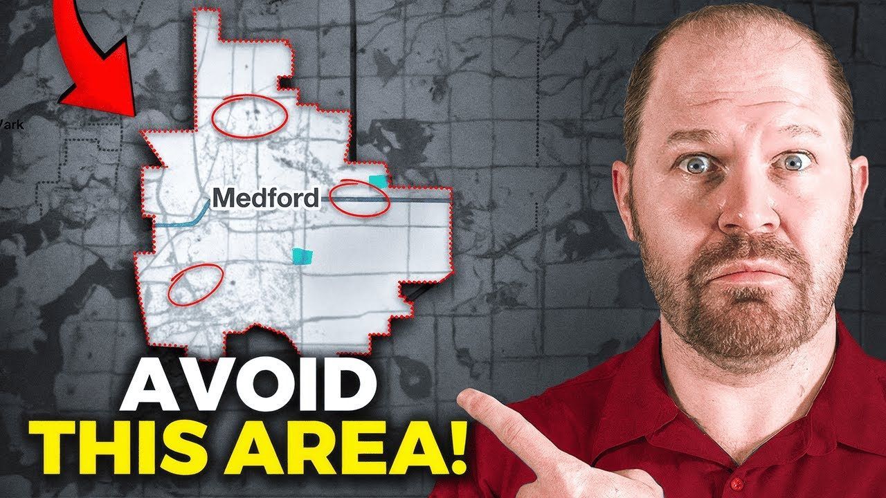 Man pointing at a map of Medford, Oregon, with circled areas, warning 