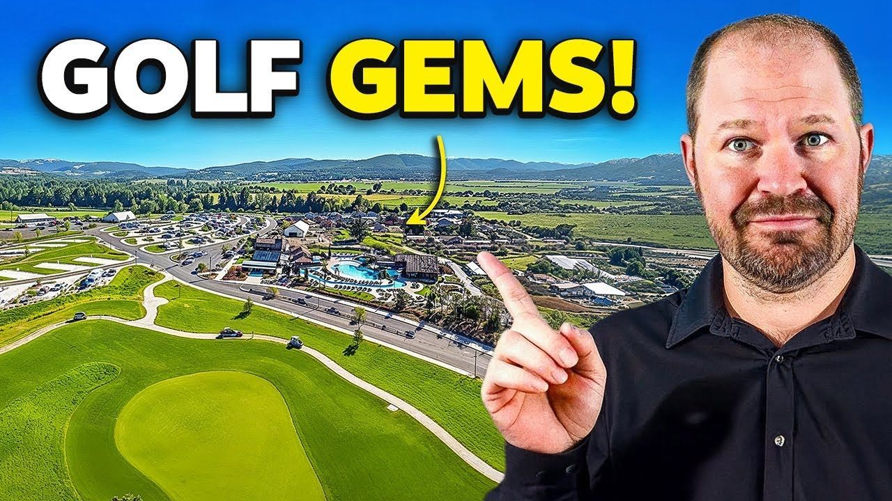 Man pointing at golf course, aerial view. 