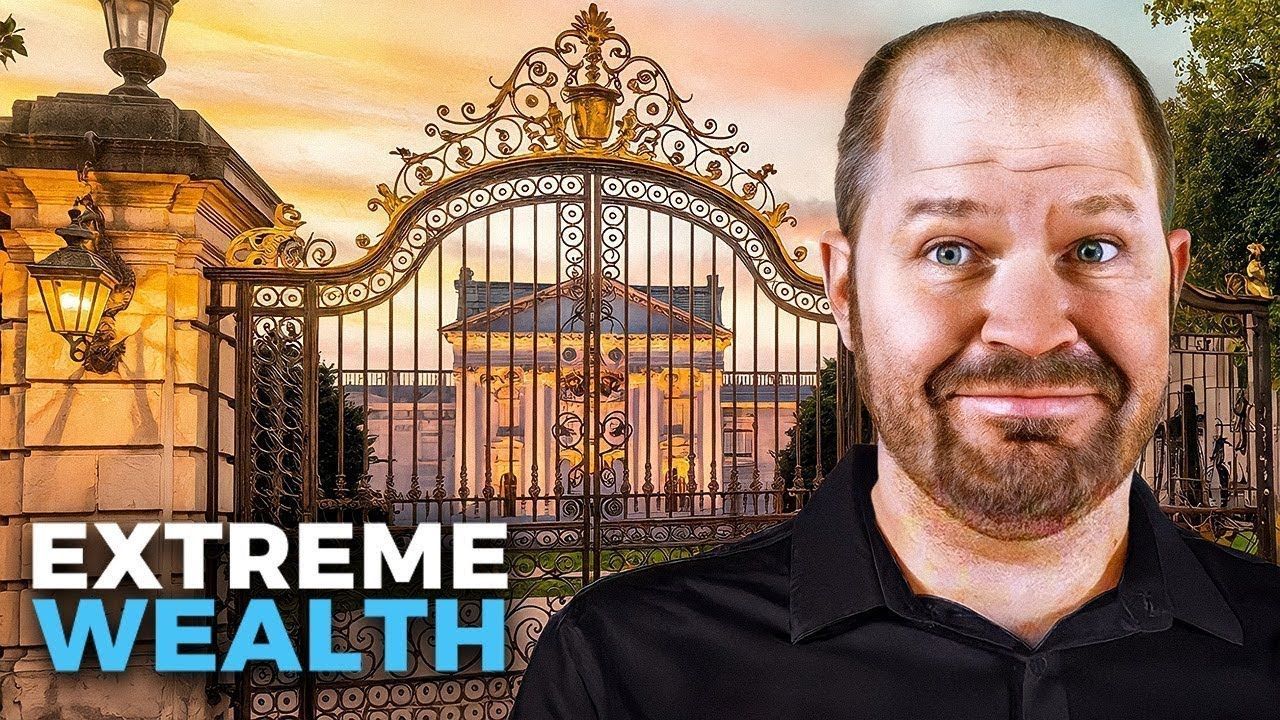 A man with a beard is standing in front of a gate.
