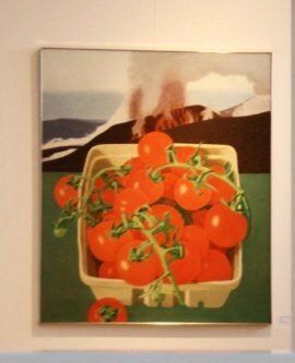 Ein Gemälde von Tomaten, das an einer Wand hängt