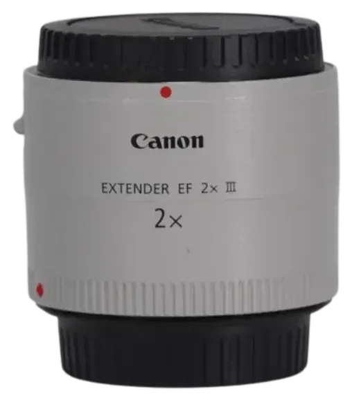 Se muestra un extensor Canon EF 2x sobre un fondo blanco.