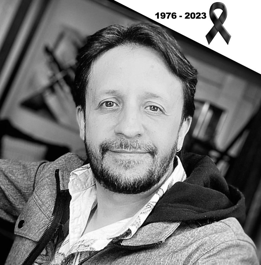 Una fotografía en blanco y negro de un hombre con barba