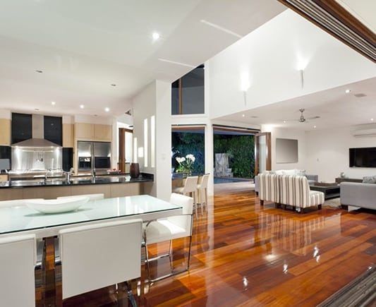 Modern, Open-concept Kitchen and Living Area With Hardwood Floors — Property Transfer Professionals In Wyong, NSW