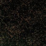 A close up of a black granite counter top.