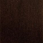 A close up of a brown tile with a grainy texture.