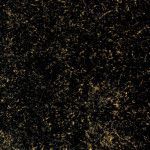 A close up of a black and gold carpet texture.