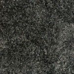 A close up of a black carpet texture.