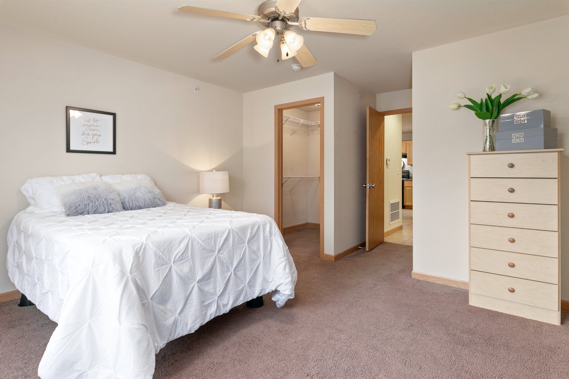 Fully furnished bedroom with walk-in closet