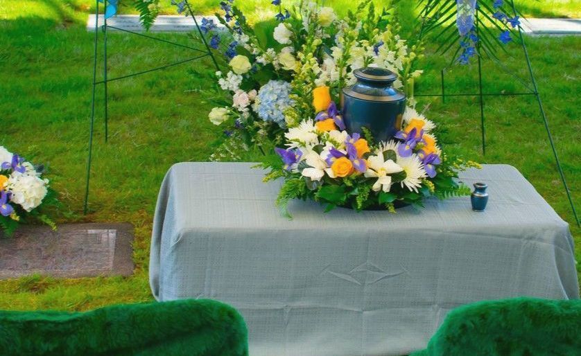 A graveside service gives you the opportunity to honor your loved one following cremation at the site of their final resting place. This can be wherever the inurnment takes place, such as a grave site where the urn with cremains will be buried, or at a niche or crypt where the cremains will be kept. You may personalize graveside services with singing, scripture readings, a eulogy, and other meaningful gestures. 
