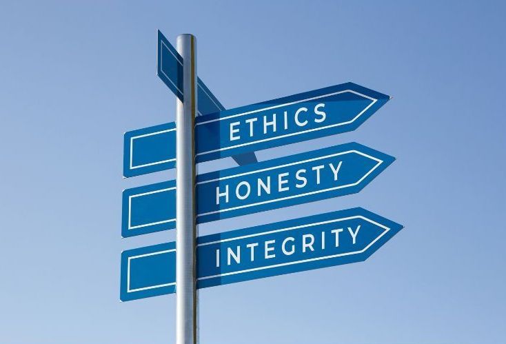A sign that says ethics honesty integrity on it