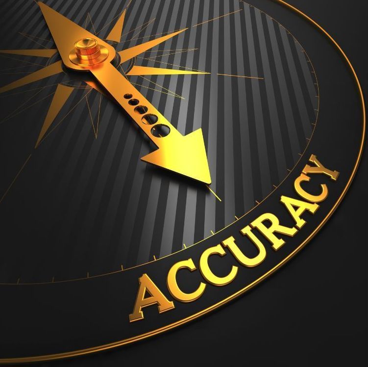 A compass with a gold arrow pointing to the word accuracy