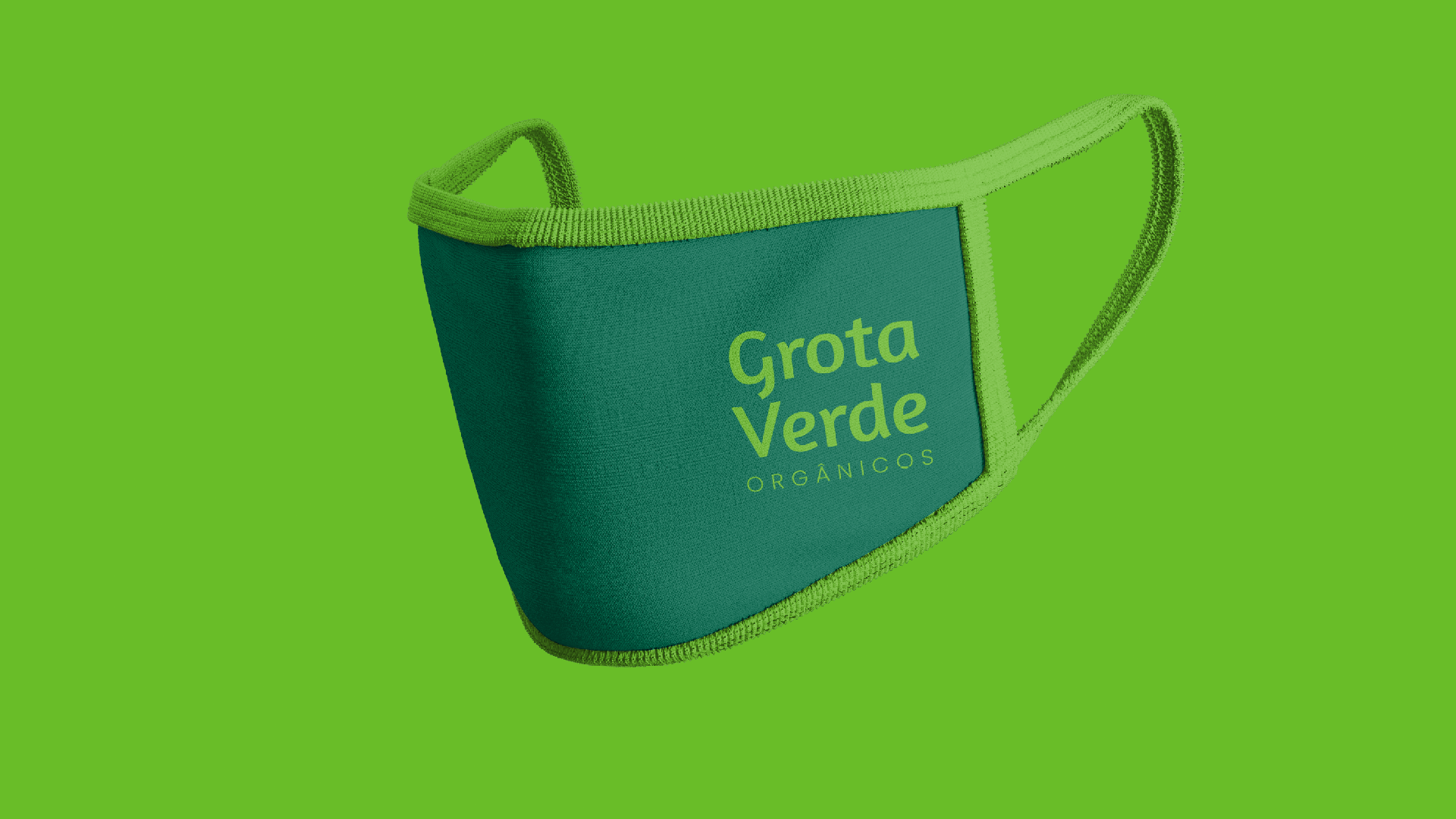 Uma máscara facial azul e verde em um fundo verde.