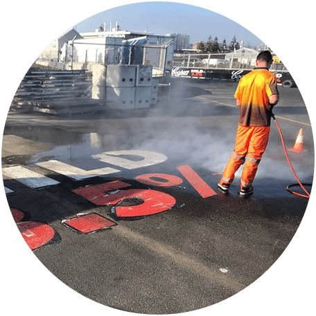 Man Removing Road Text